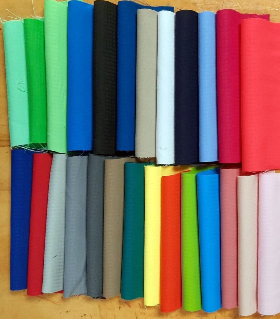 Muestrario de colores de tela para camisas tipo Columbia